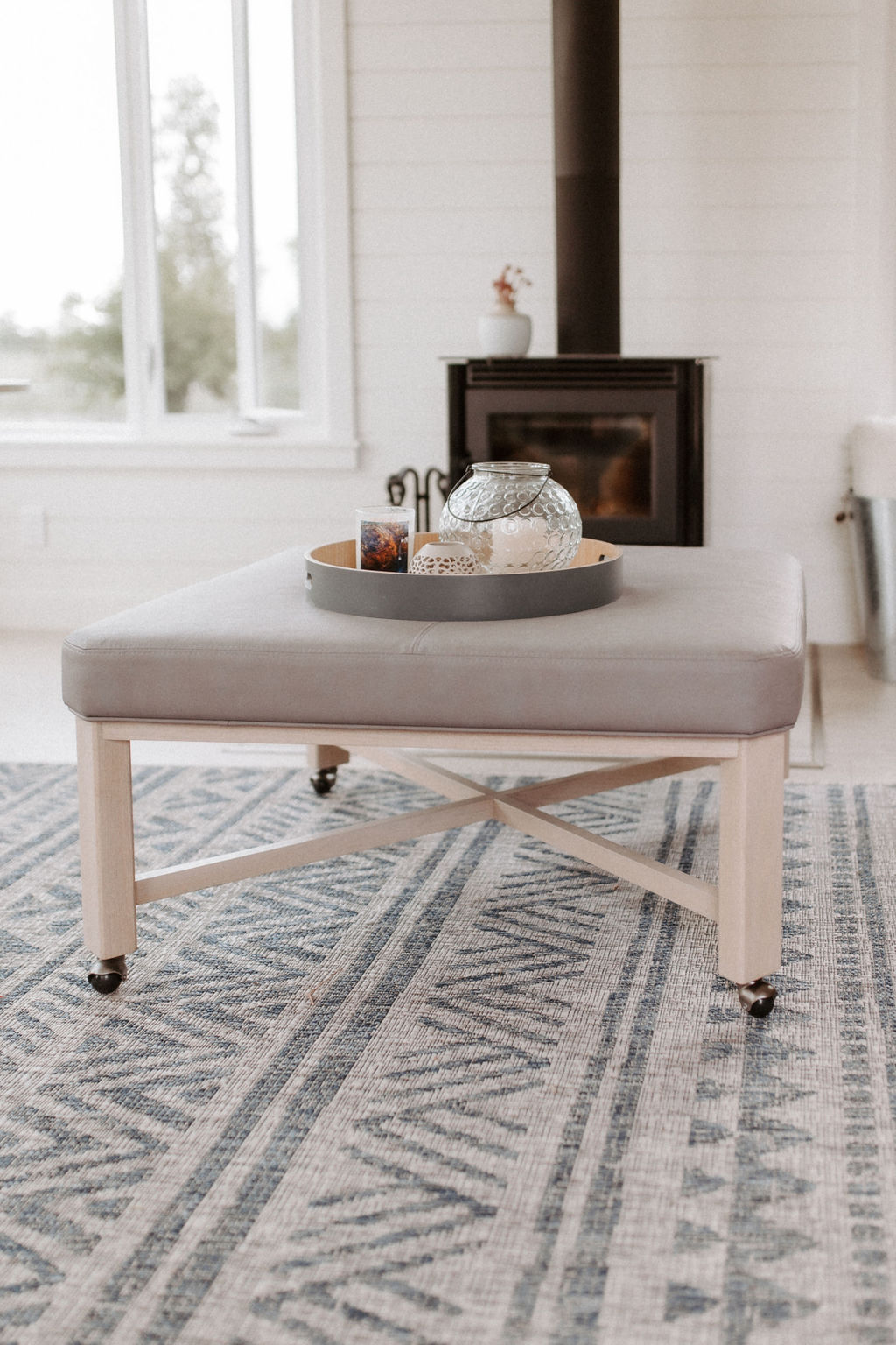 Upholstered ottoman.